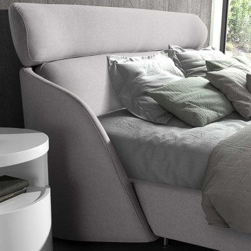 Letto matrimoniale moderno dal design morbido e confortevole