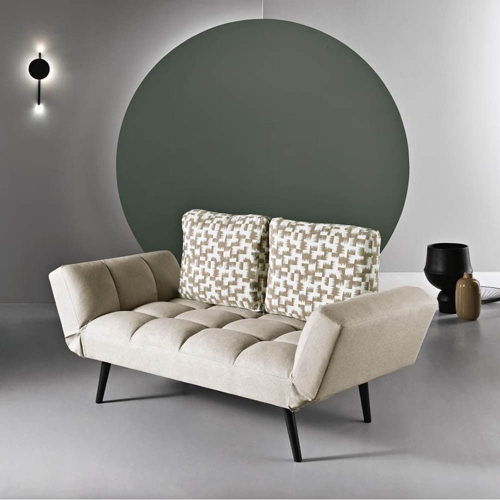 Modern sofa with adjustable armrests made by Ikone Casa