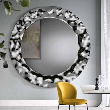 Elegant and refined glass mirror in two finishes