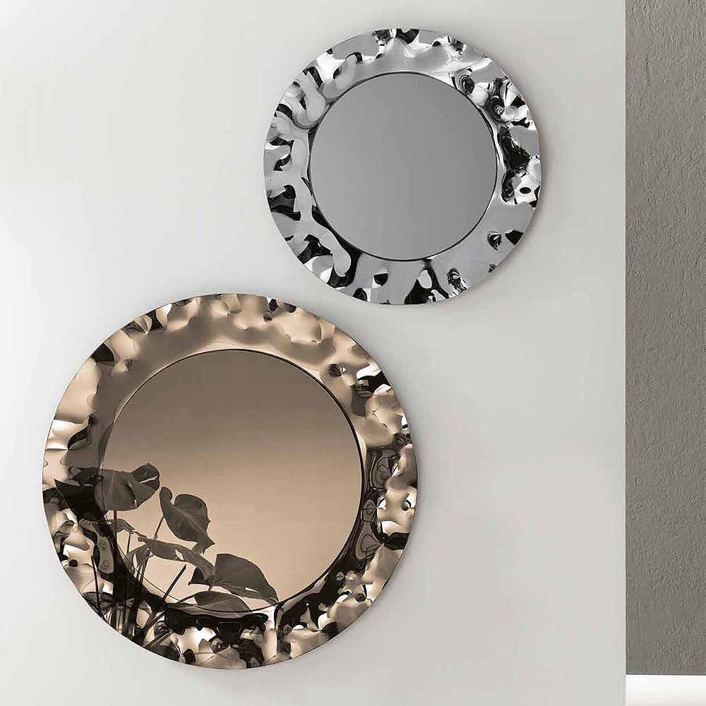 Elegant and refined glass mirror in two finishes