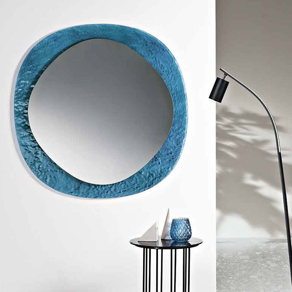 Curved mirror with hammered glass frame for a unique touch